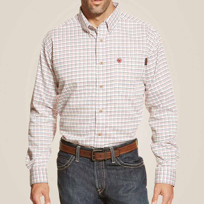 A man wearing Ariat FR gauge checkered shirt