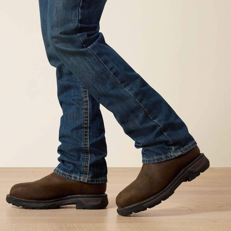 Close up of man wearing Ariat FR straight leg jean