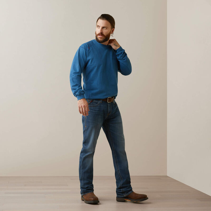 A man wearing Ariat FR Crew T-shirt in blue color