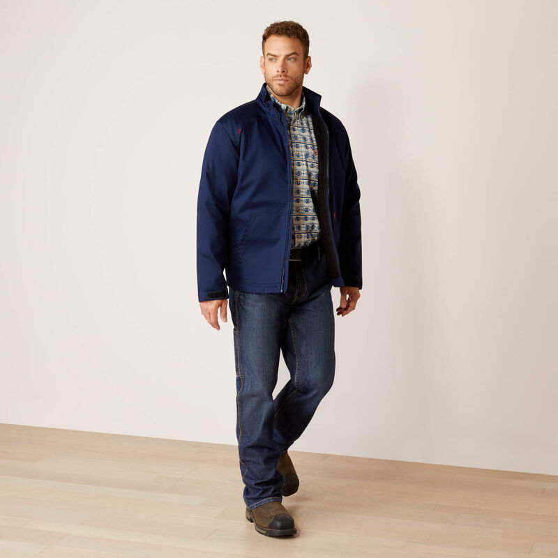 A man wearing Ariat FR insulated jacket in navy