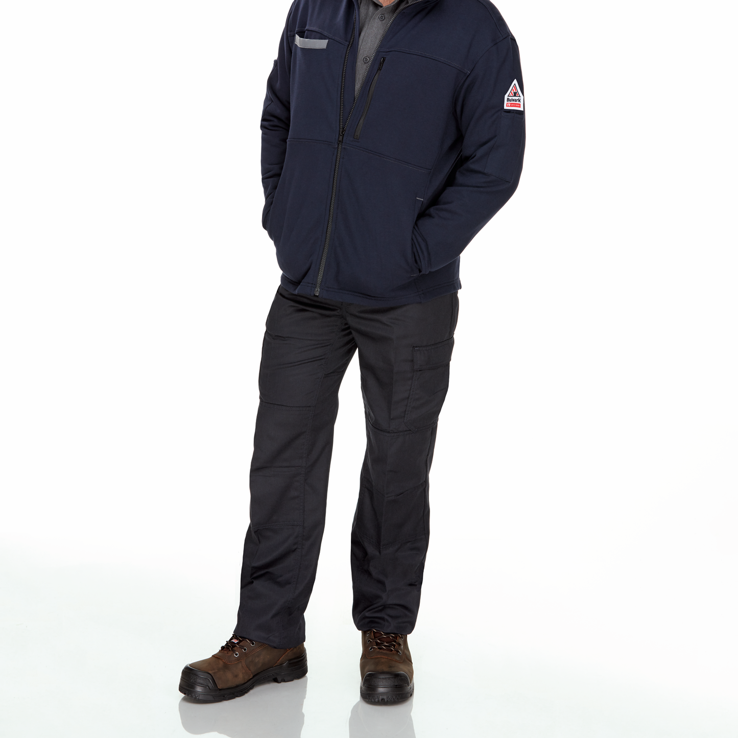 A man standing wearing Bulwark Men’s Naby FR Fleece Zip-Up Jacket