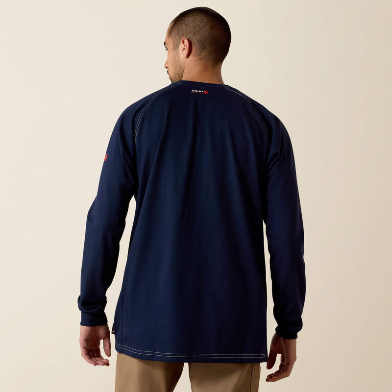 Back view  of a man wearing ariat work crew t-shirt in navy