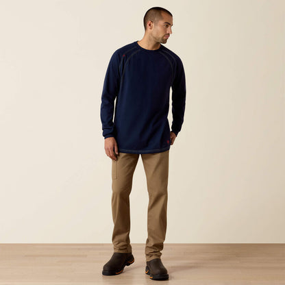 A man wearing ariat work crew t-shirt in navy