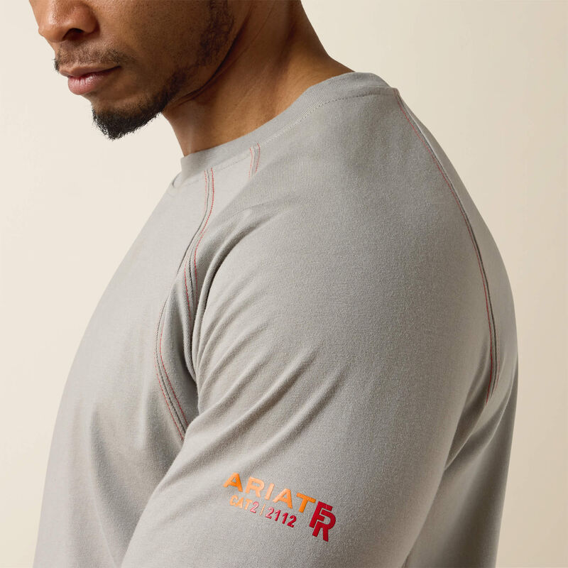 Side view close up of a man wearing ariat work crew t-shirt in grey