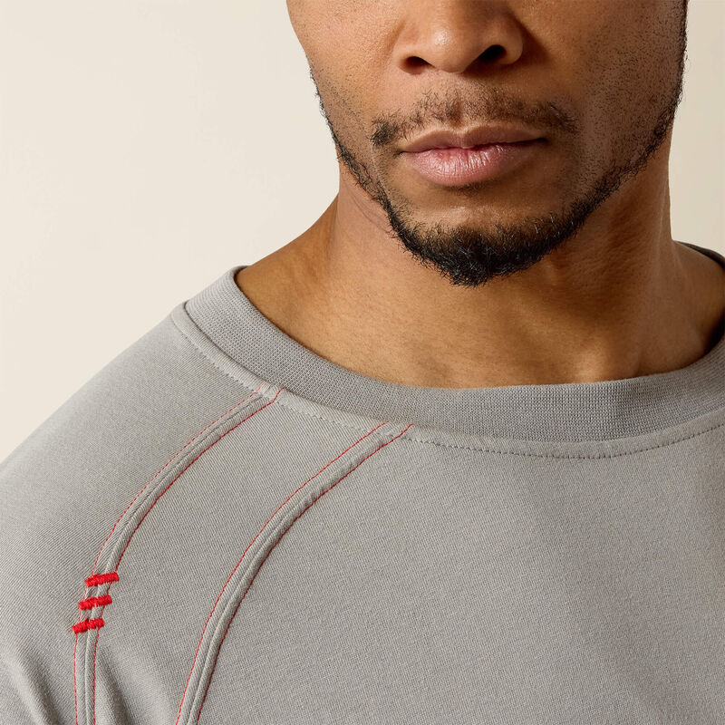 Close up of a man wearing ariat work crew t-shirt in grey