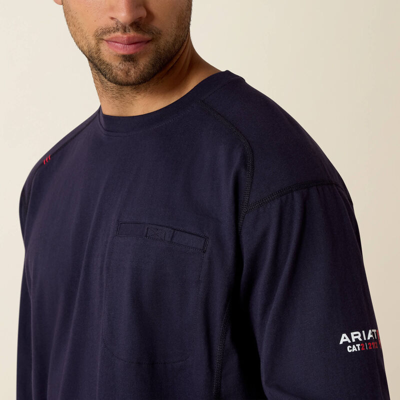 Close up of man wearing Ariat FR Crew T-shirt in navy color