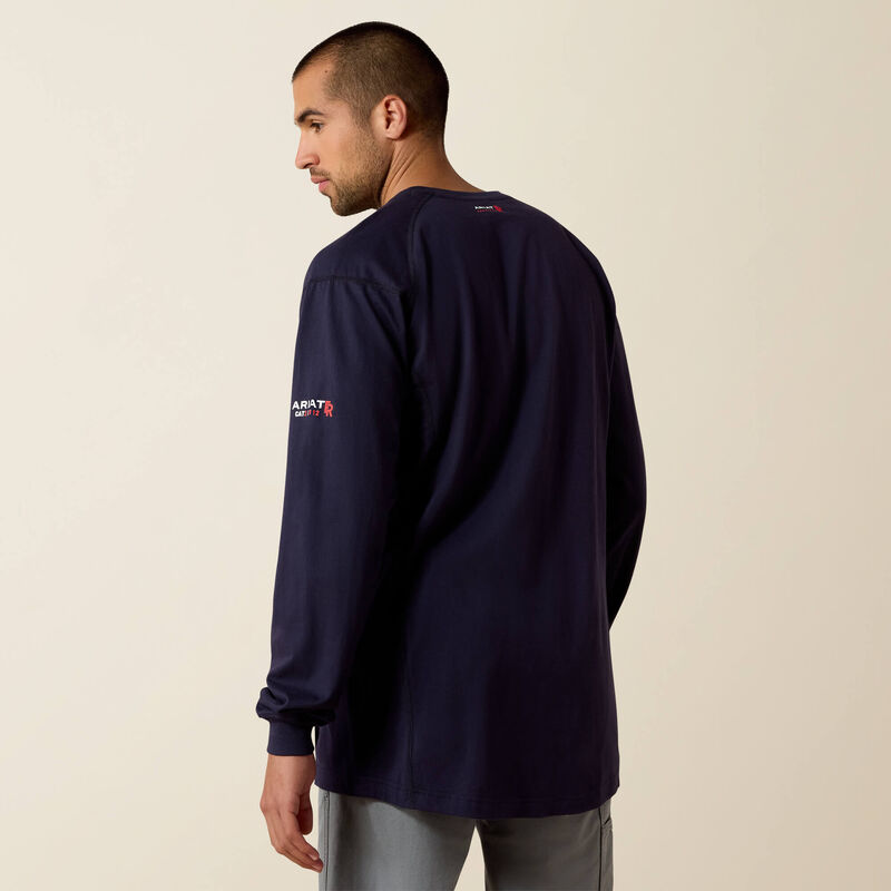 Back view of man wearing Ariat FR Crew T-shirt in navy color
