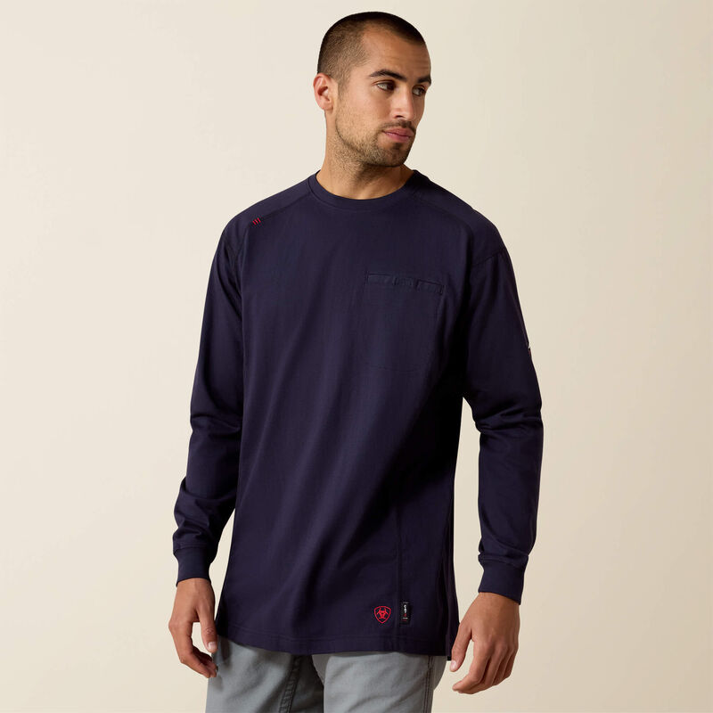 A man wearing Ariat FR Crew T-shirt in navy color