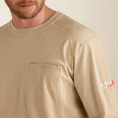 Closeup of a man wearing Ariat FR Crew T-shirt in beige