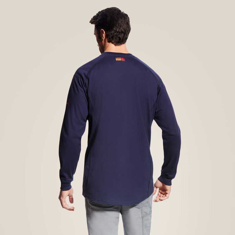 Backview of a man wearing Blue Ariat FR Henley Shirt