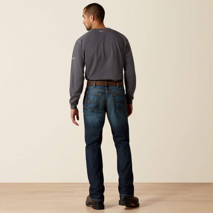 Back view of a man wearing Ariat FR duralight boot cut jean