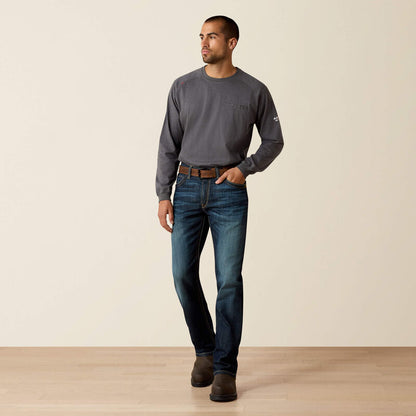 A man wearing Ariat FR duralight boot cut jean