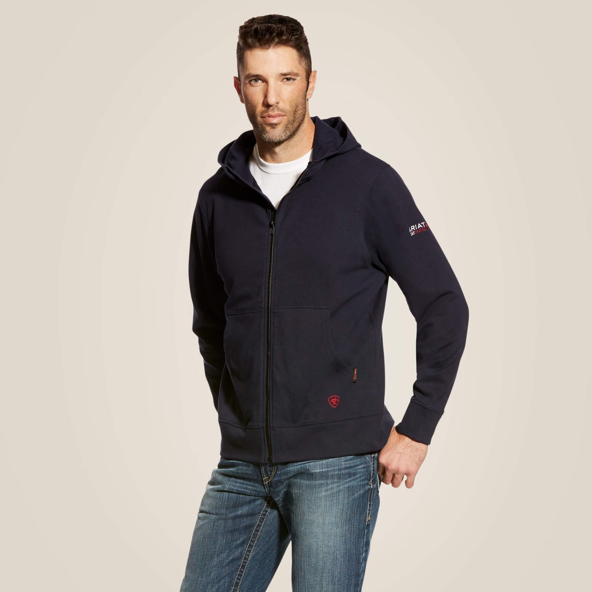 A man wearing Ariat FR durastretch full zip hoodie in navy color