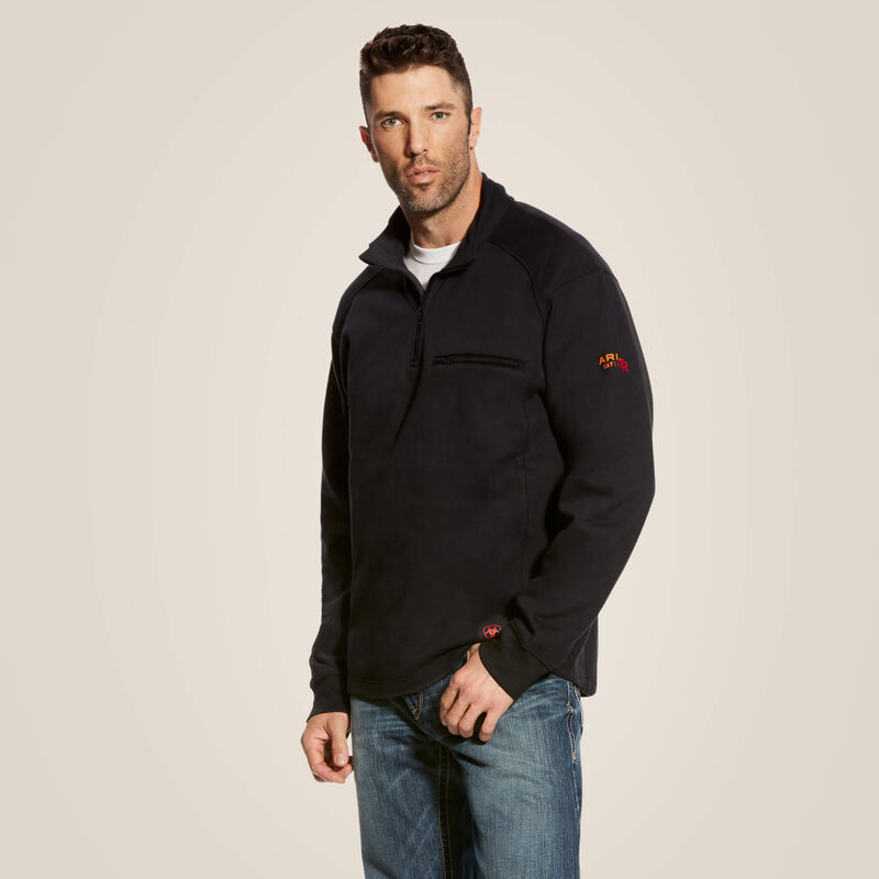 A man wearing ariat 1/4 zip FR pullover in black color