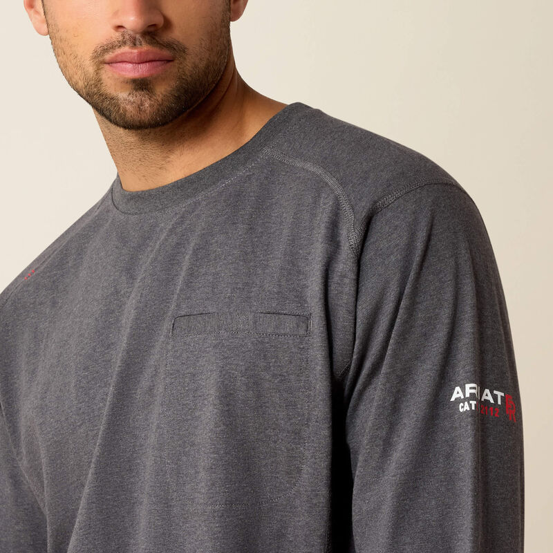 Close up of a man wearing Ariat FR Crew T-shirt in charcoal heather
