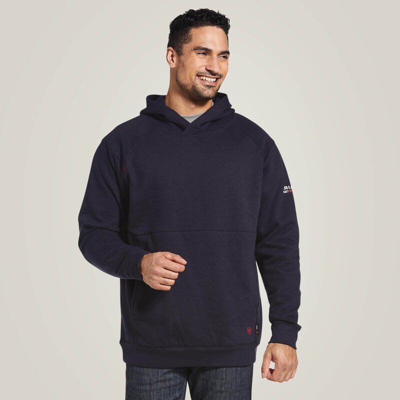 A man wearing Ariat FR pullover hoodie in blue