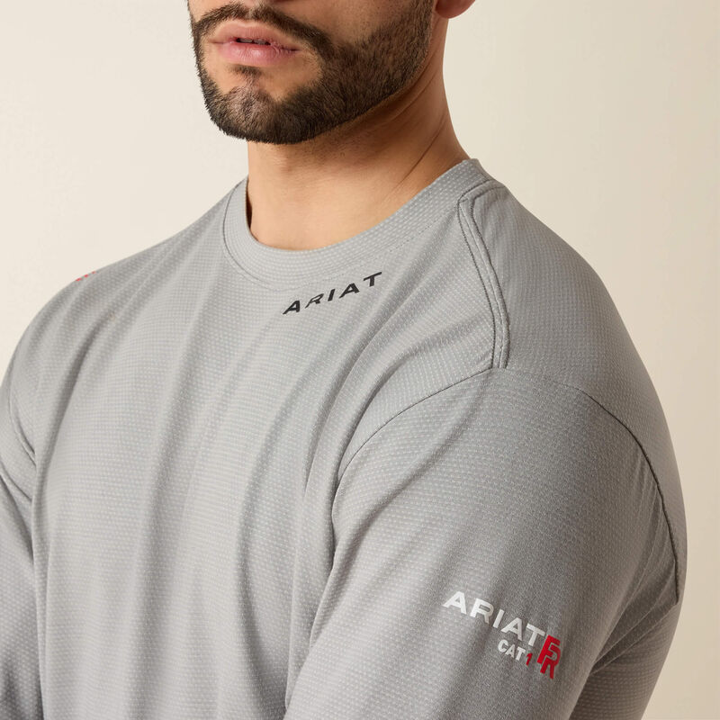 Sideview closeup of a man wearing Ariat Baselayer T-shirt in grey