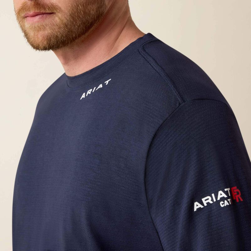Closeup of a man wearing Ariat Baselayer T-shirt in navy