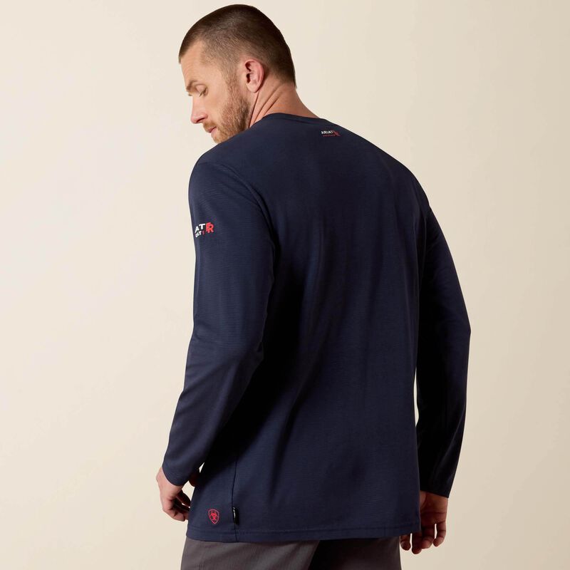 Backview of a man wearing Ariat Baselayer T-shirt in navy