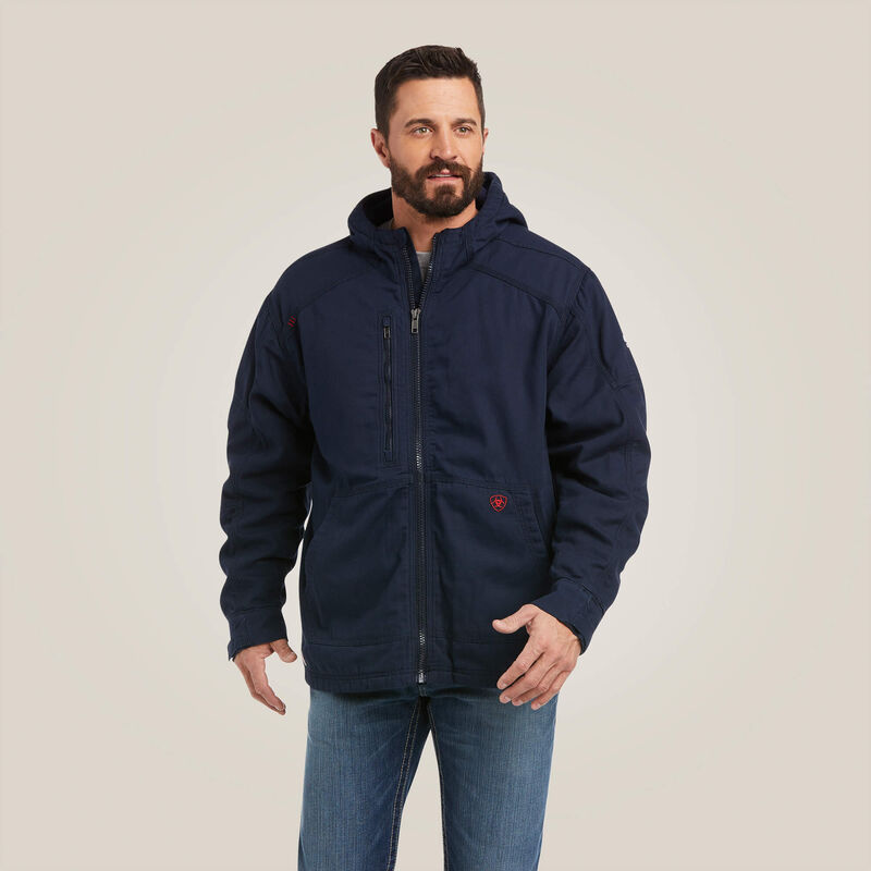 A man wearing blue Ariat stretch FR jacket