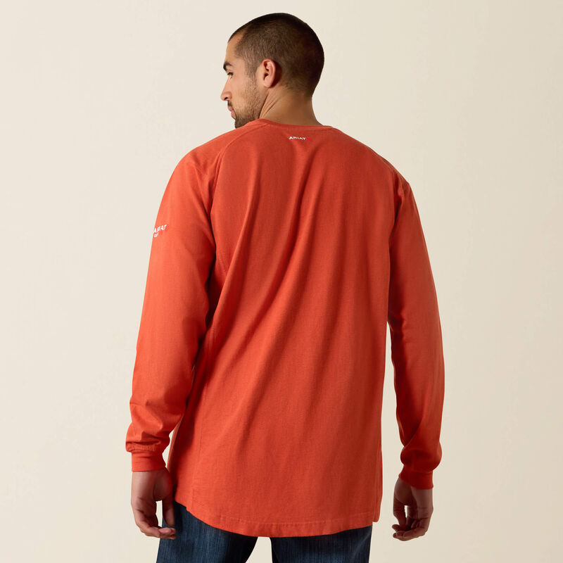 Back view of a man wearing Ariat FR Crew T-shirt in volcanic heather