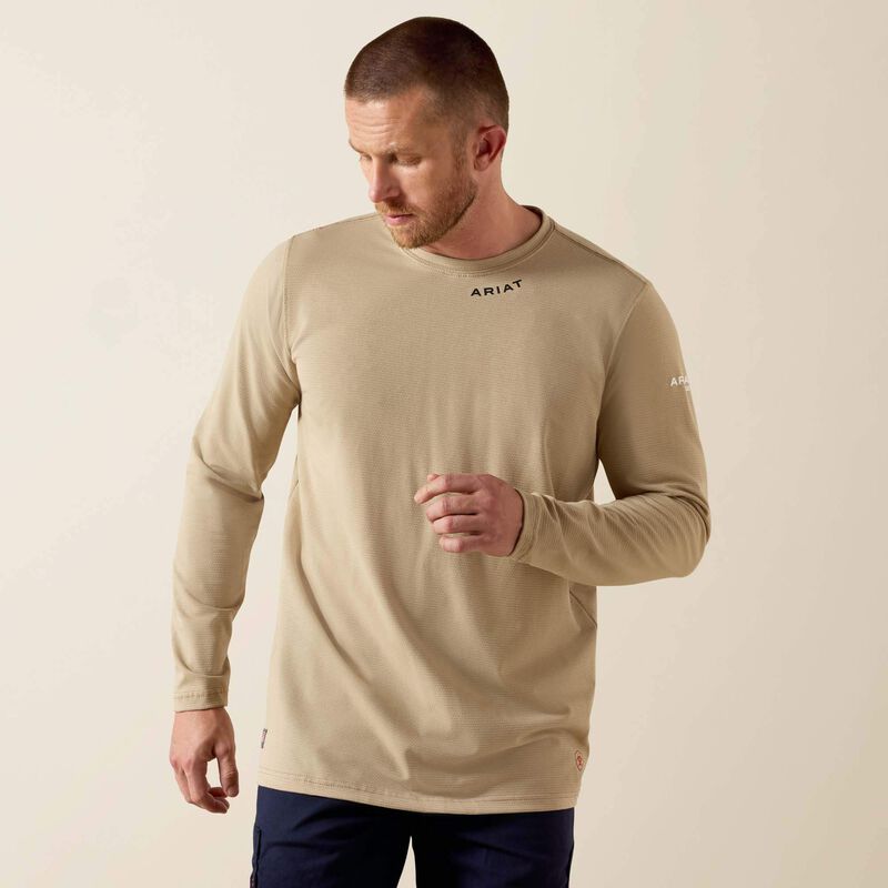 A man wearing Ariat Baselayer T-shirt in beige