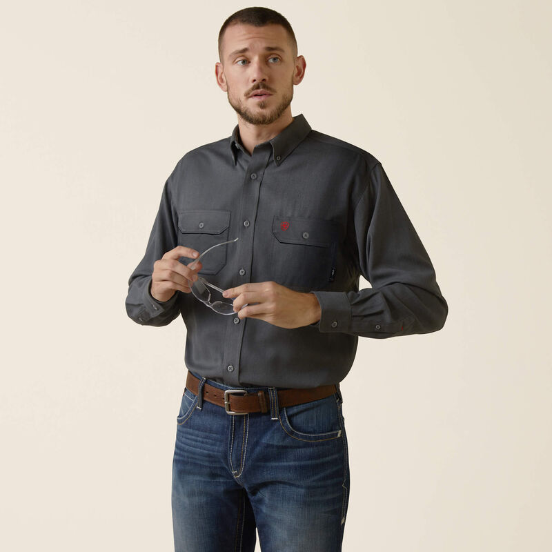 A man wearing Ariat FR ultralight work shirt in charcoal heather