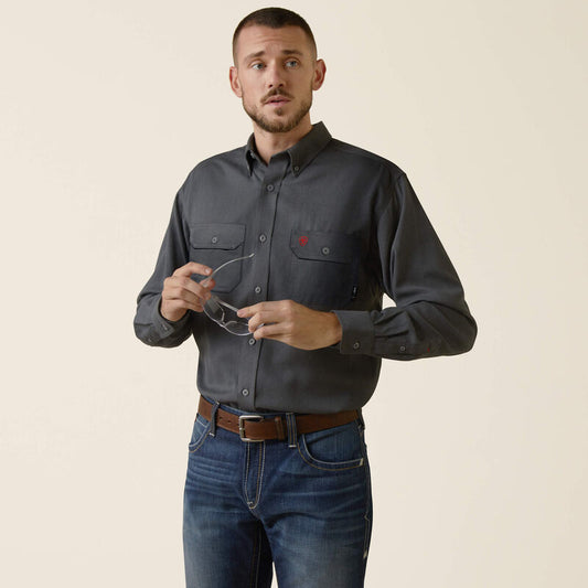 A man wearing Ariat FR ultralight work shirt in charcoal heather