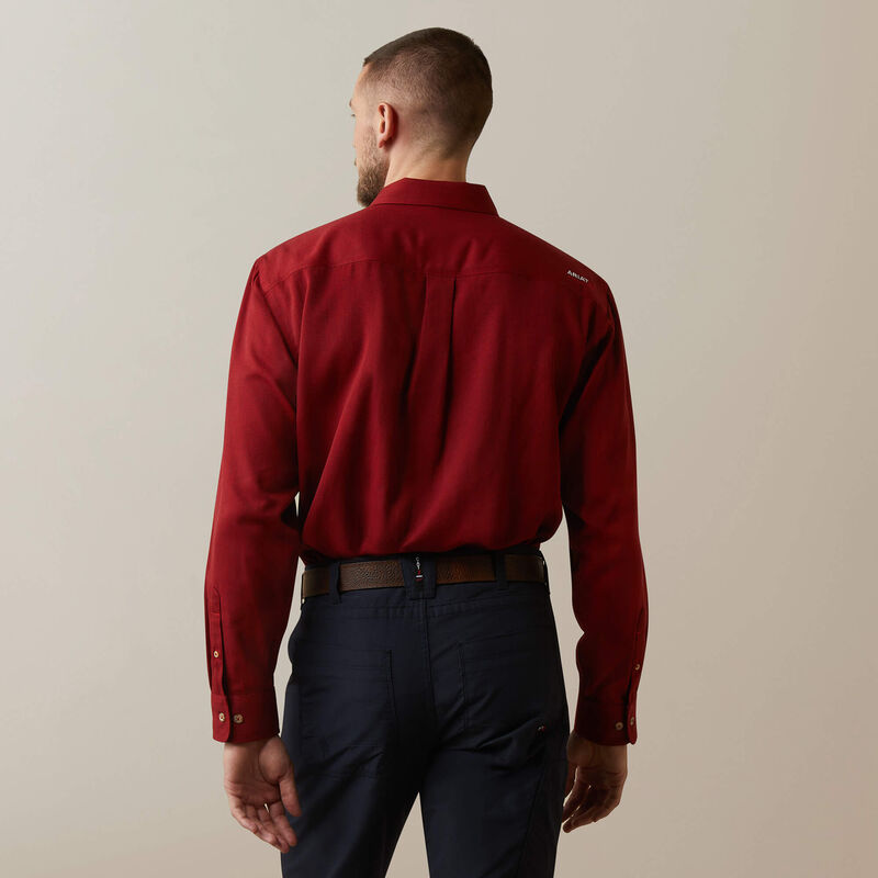 Backview of a man wearing Ariat FR ultralight work shirt in red heather