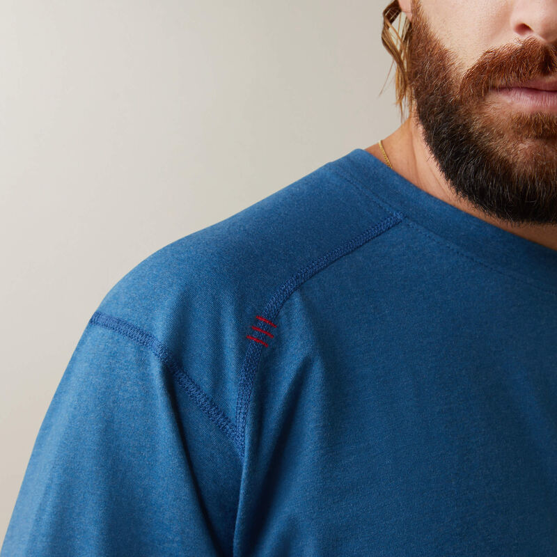 Close up of man wearing Ariat FR Crew T-shirt in blue color