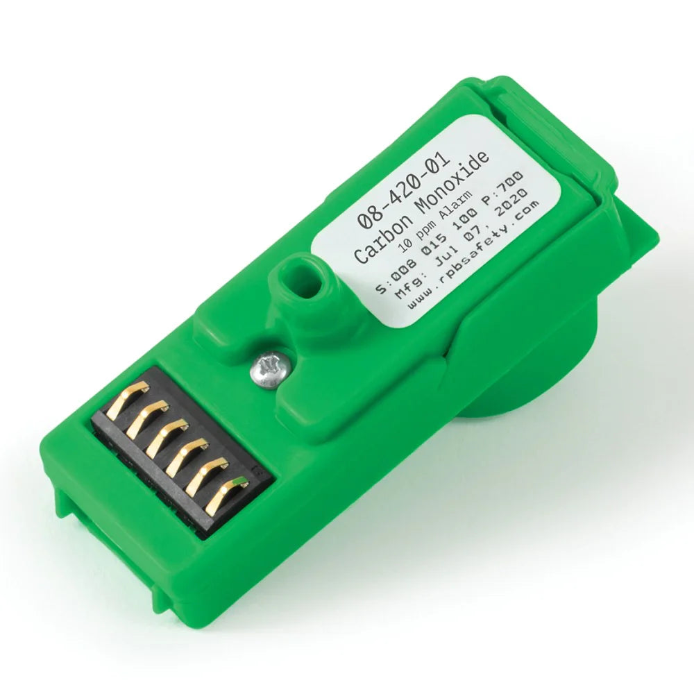 Green electronic sensor with label on a white background