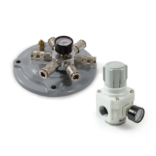 Two pressure regulators on a white background