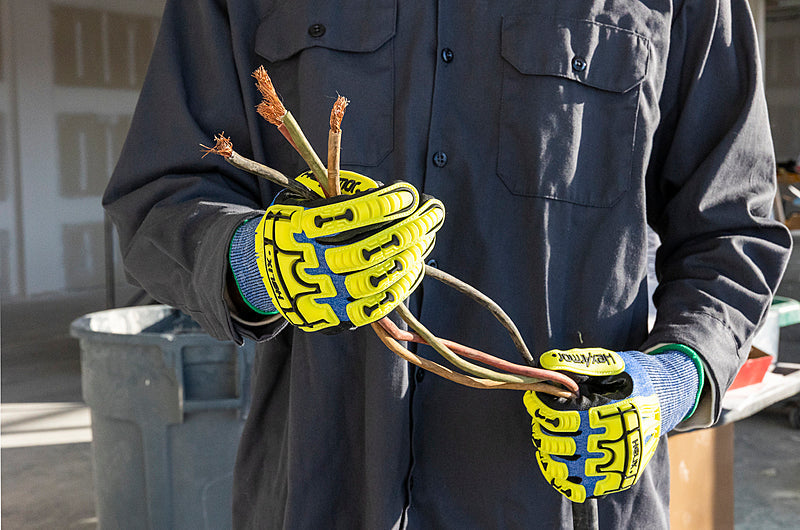 A person wearing HexArmor A4 cut resistant impact gloves
