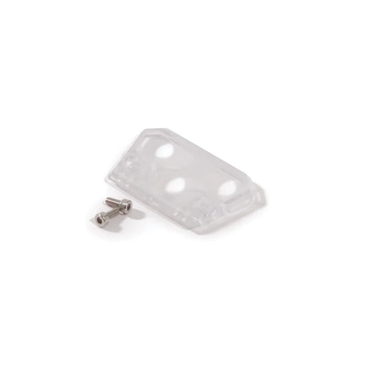 Clear plastic component with a small metal screw on a white background