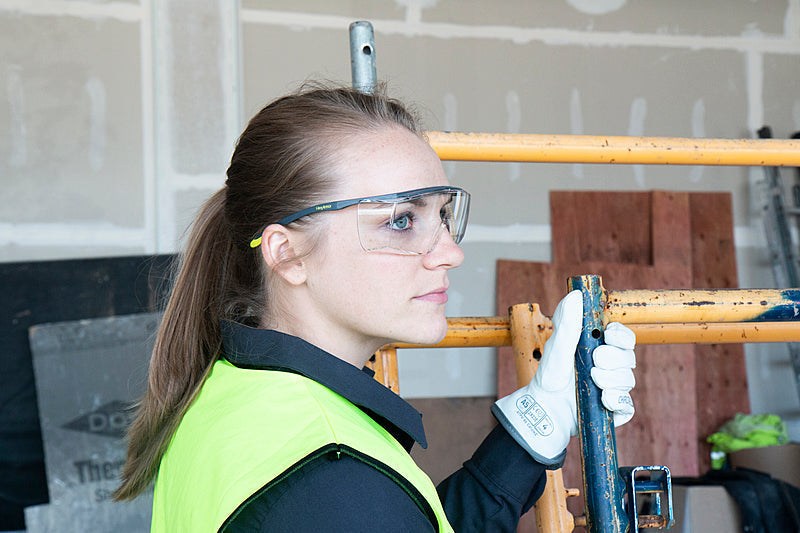 A person wearing HexArmor LT250 clear safety glasses
