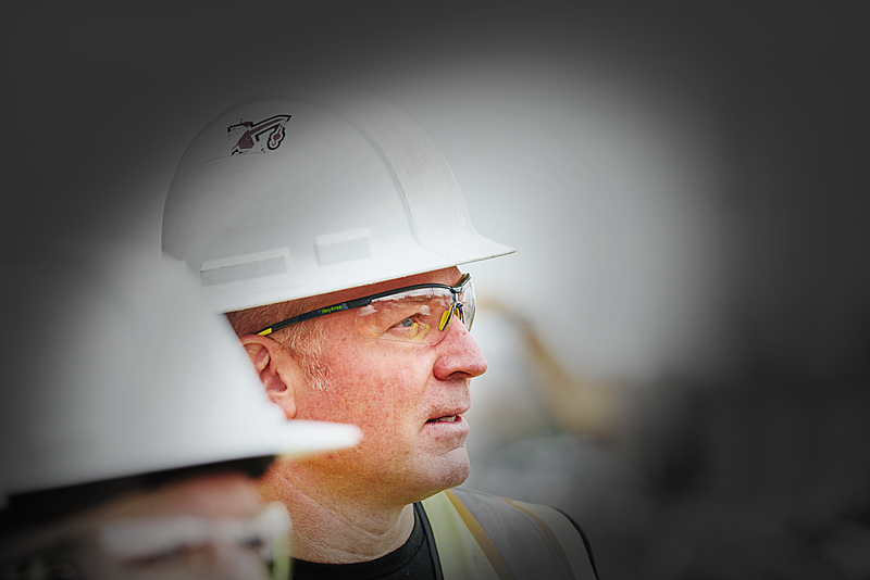 A person wearing HexArmor VS250 Safety Glasses