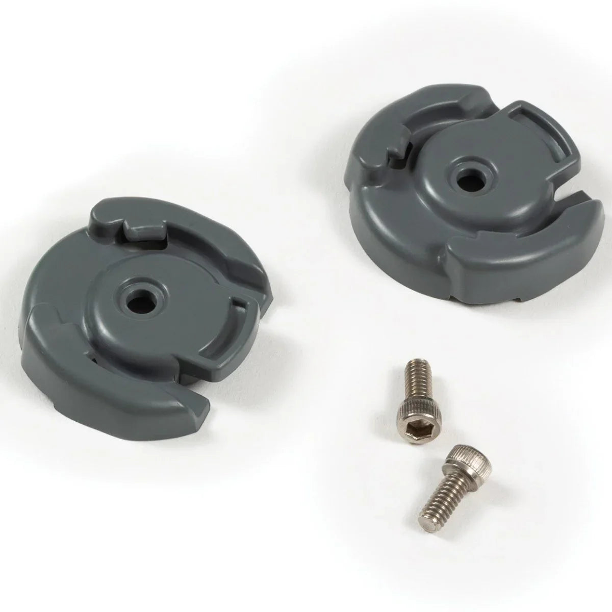Two gray plastic components with two screws on a white background